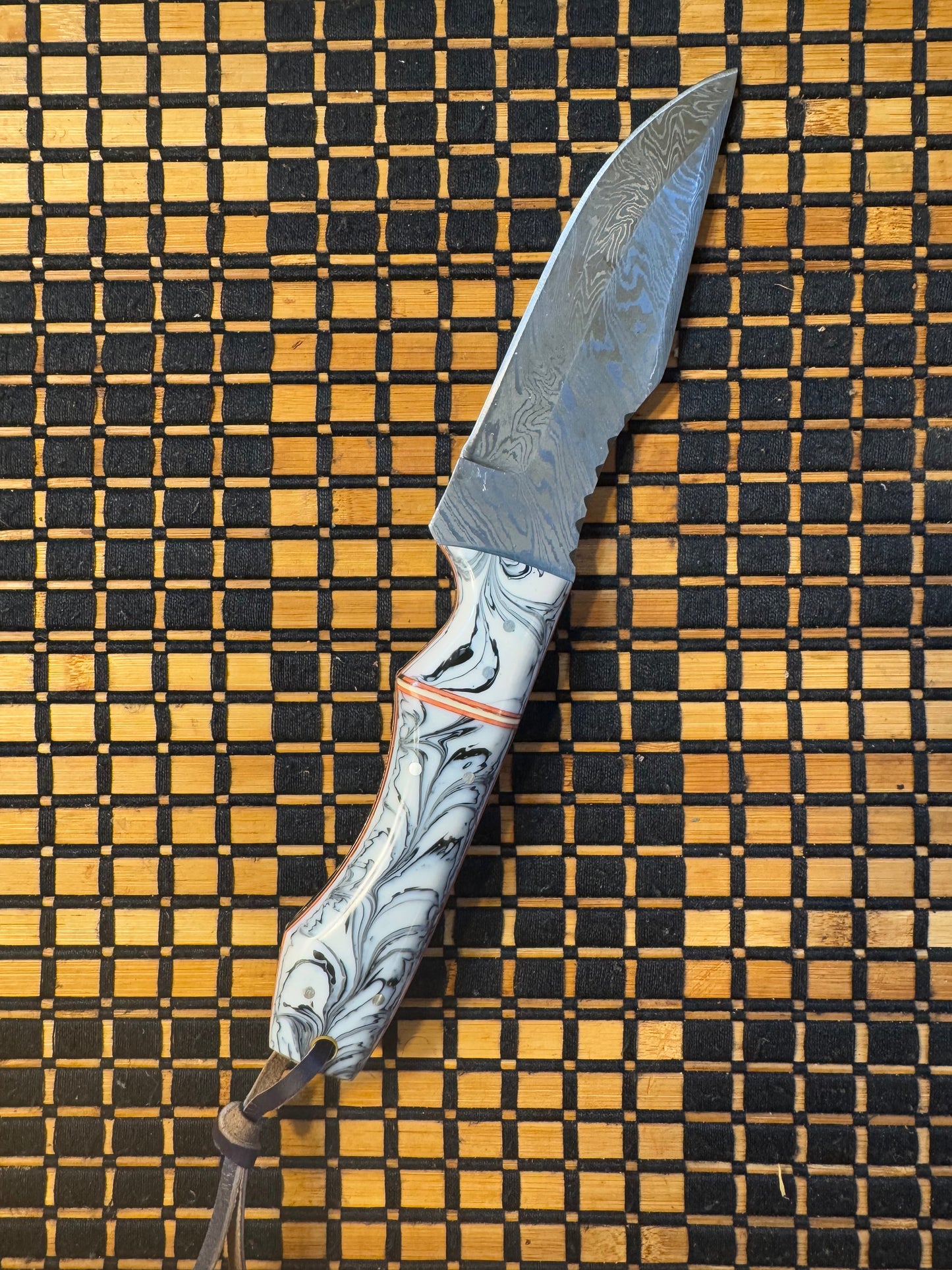 Damascus knife with leather sheath