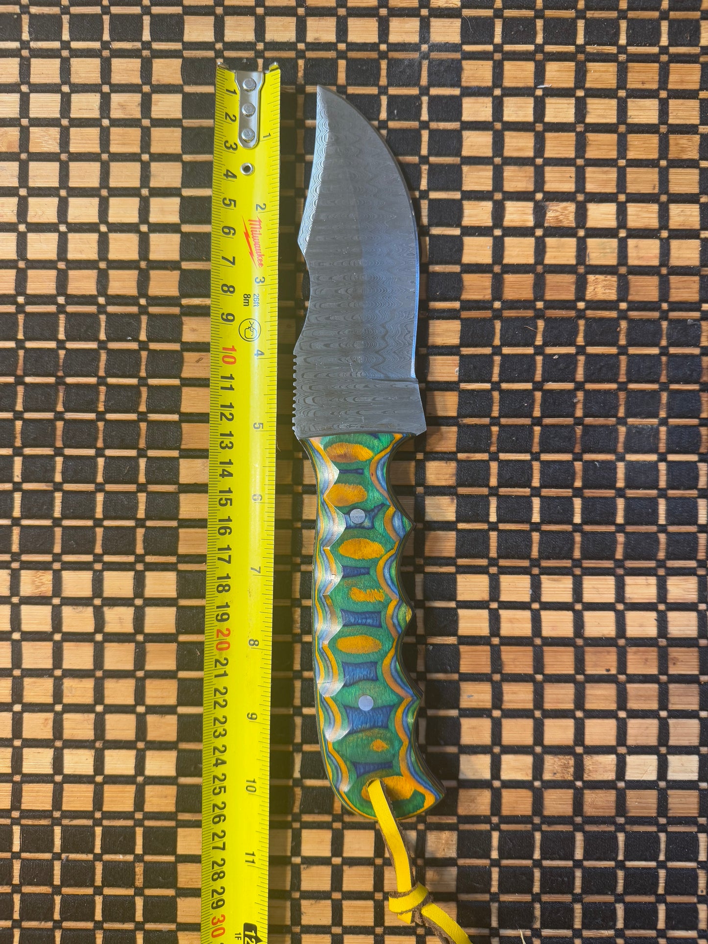 Damascus knife with leather sheath