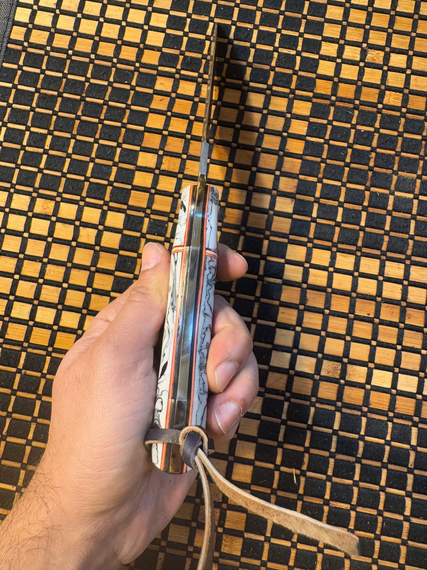 Damascus knife with leather sheath