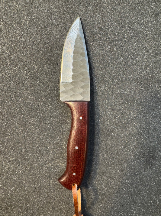 Damascus blade with micarta handle